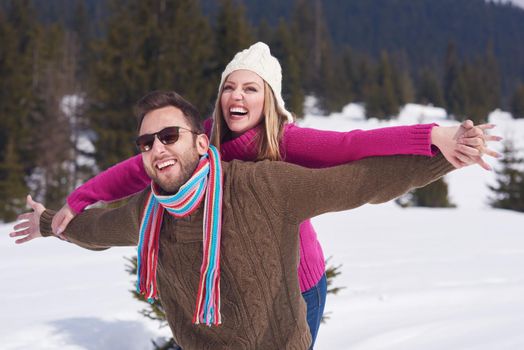 portrait of happy young romantic tourist  couple outdoor in nature at winter vacation