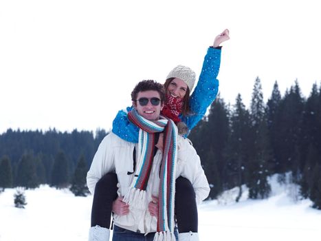 portrait of happy young romantic tourist  couple outdoor in nature at winter vacation