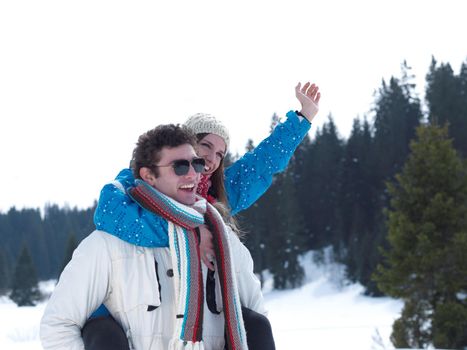 portrait of happy young romantic tourist  couple outdoor in nature at winter vacation