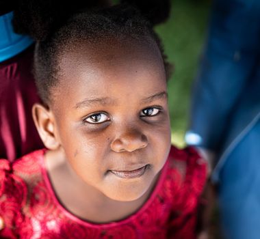 Cute little black African girl close up