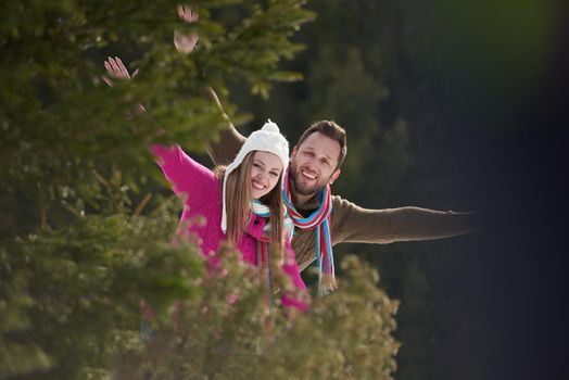 portrait of happy young romantic tourist  couple outdoor in nature at winter vacation