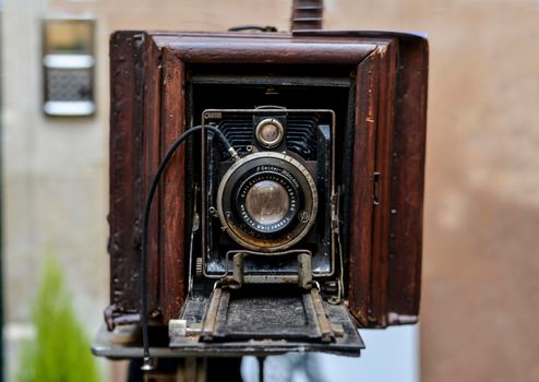 LE MANS, FRANCE - OCTOBER 02, 2016: Old big vintage camera of wood and metal close on the street of France
