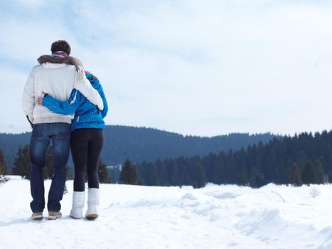 portrait of happy young romantic tourist  couple outdoor in nature at winter vacation