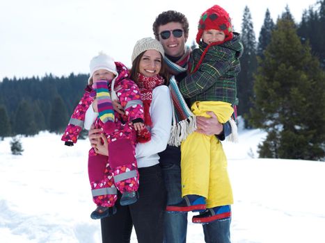 Winter playing, fun, snow and family portrait  sledding at winter time