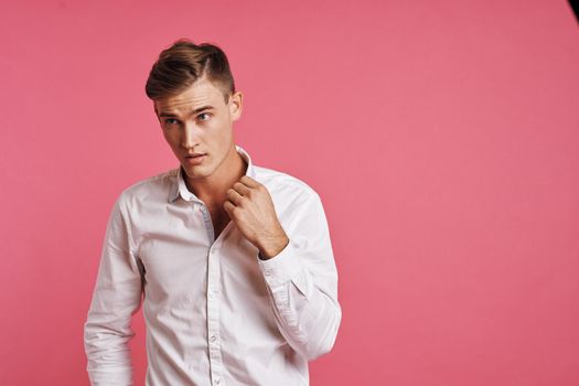 portrait of a man posing white shirt fashion self confidence isolated background. High quality photo