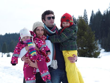 Winter playing, fun, snow and family portrait  sledding at winter time