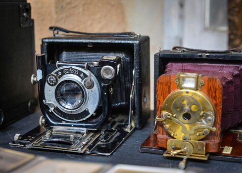 LE MANS, FRANCE - OCTOBER 02, 2016: Old vintage camera accordion on the market on the street of France