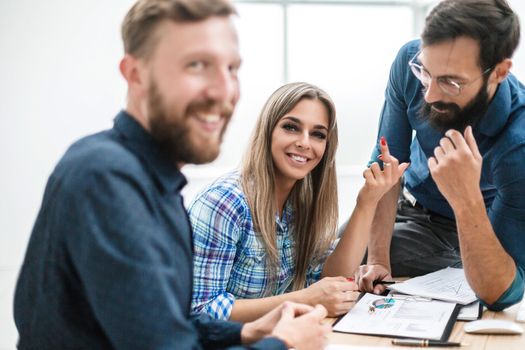 close up. group of business people sitting at their Desk . the concept of teamwork