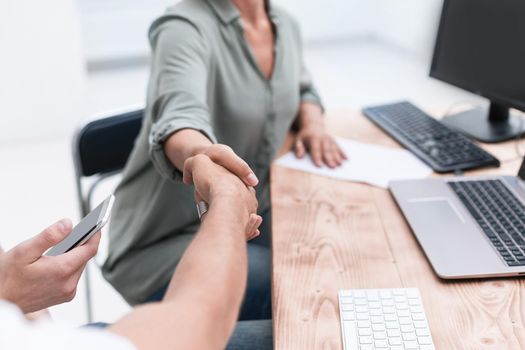 close up. handshake Manager and client during the meeting. photo with space for text
