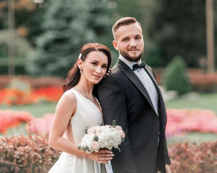 portrait of happy bride and groom on their wedding day. photo with copy space