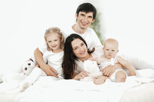 background image of a happy young family.photo with copy space.