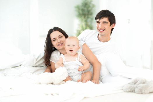 family portrait of a happy young family.photo with copy space.the concept of parenthood