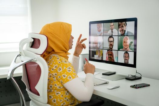 Middle Eastern businesswoman having the online conference