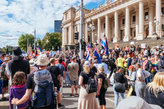 Melbourne, Australia - November 20, 2021: Protesters opposing the Pandemic Legislation being tabled in the Victorian Parliament on November 20, 2021 in Melbourne, Australia.