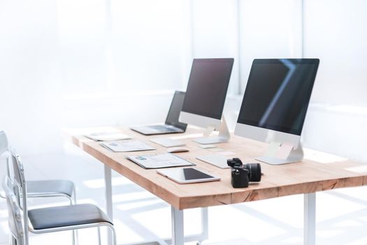 work Desk for a creative business team in a modern office. photo with copy space