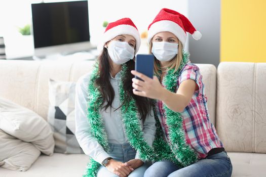 Portrait of best friends taking video congratulation with new year, holiday during pandemic. New year, virus, celebration, technology, social media concept