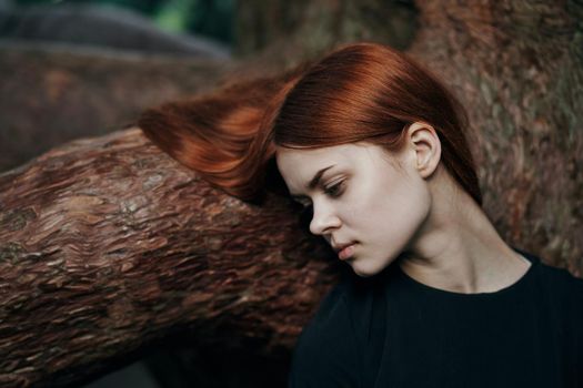 woman in black dress nature walk garden trees fresh air. High quality photo