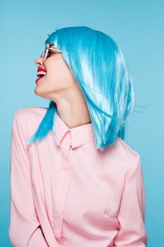 beautiful woman in blue wig sunglasses Glamor fashion. High quality photo