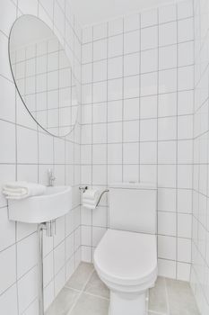 Interior of an attractive restroom with small sink