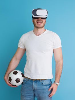 Happy man getting experience using VR headset glasses of virtual reality, isolated on blue background
