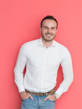 portrait of a handsome young man isolated over a red background