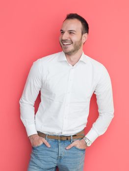portrait of a handsome young man isolated over a red background