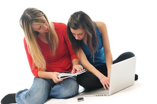 two young woman student work on laptop isolated