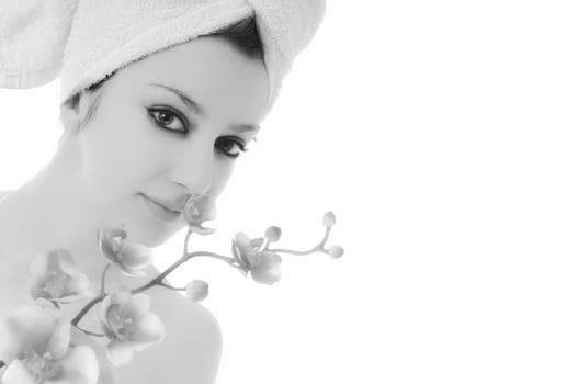 beauty halth and spa wellness isolated young woman face portrait closeup with towel and flower treatment