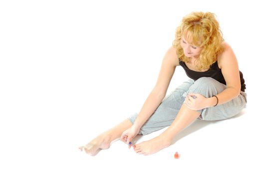 woman leg care concept with woman foots and hands isolated on white