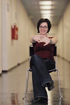 young casual woman relax indoor in big bright hold