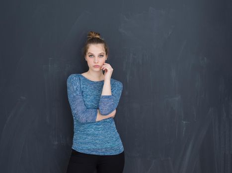portrait of Beautiful young woman isolated on grey background