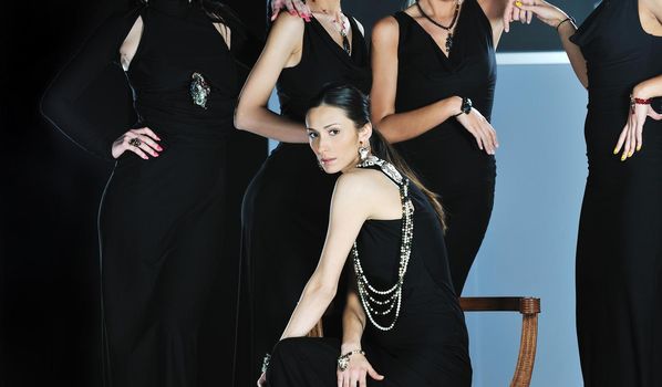 beautiful woman on fashion show piste with gold jawel
