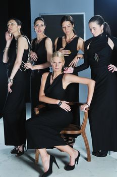 beautiful woman on fashion show piste with gold jawel