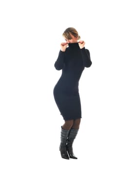 isolated happy woman in black dress and boots posing 