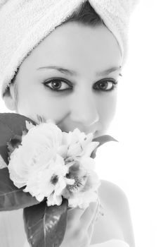 beauty halth and spa wellness isolated young woman face portrait closeup with towel and flower treatment