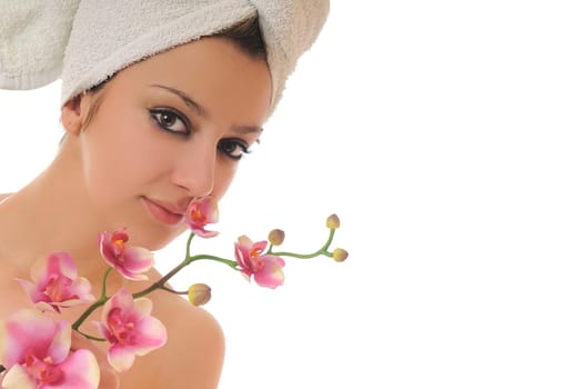 beauty halth and spa wellness isolated young woman face portrait closeup with towel and flower treatment