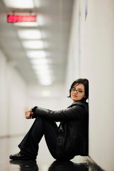 young casual woman relax indoor in big bright hold