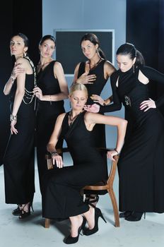 beautiful woman on fashion show piste with gold jawel