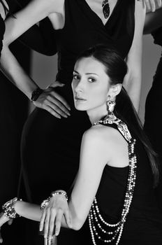 beautiful woman on fashion show piste with gold jawel