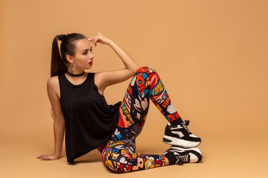 Attractive girl dancing twerk in the studio. Dancing. Hobby
