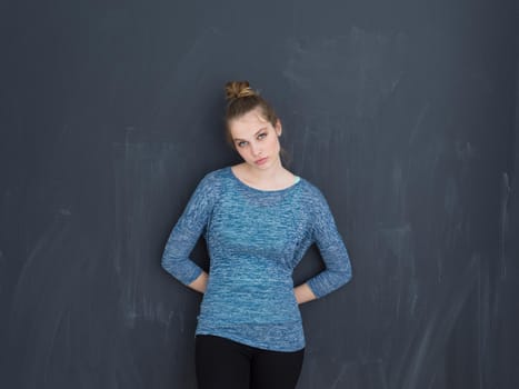 portrait of Beautiful young woman isolated on grey background