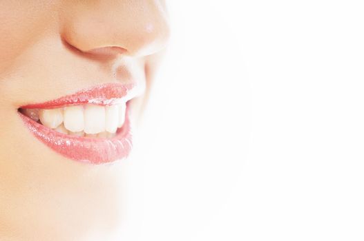 beautiful woman mouth with white teeth closeup representing dental care concept