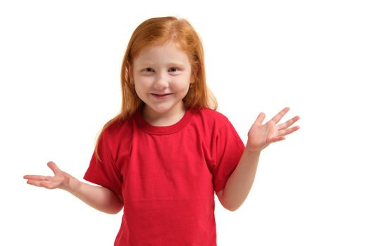 Portrait of cute redhead emotional little girl in red t-shirt isolated on a white. Beautiful studio portrait of female little caucasian person