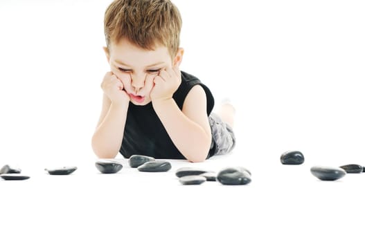 happy kid play on floor isolated on white