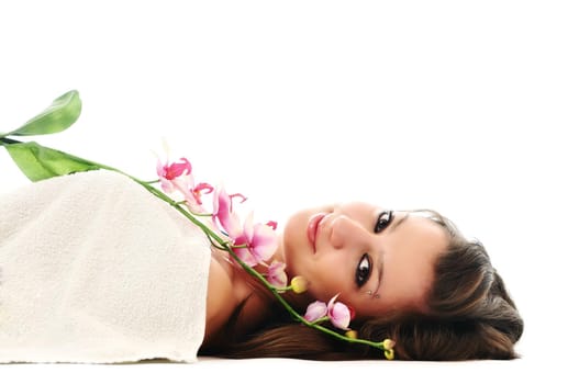 one  beautiful young  woman face with flower and towel