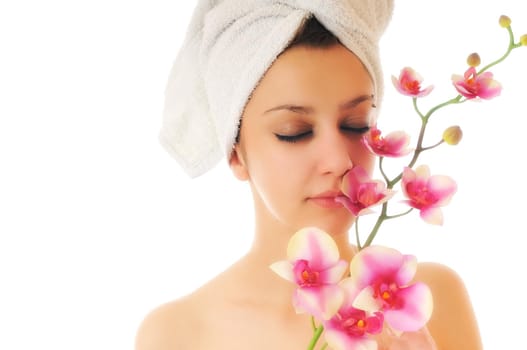 beauty halth and spa wellness isolated young woman face portrait closeup with towel and flower treatment