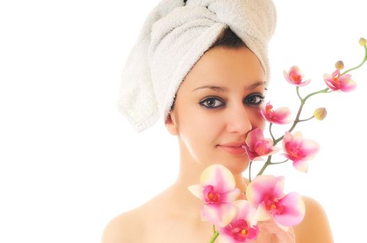 beauty halth and spa wellness isolated young woman face portrait closeup with towel and flower treatment