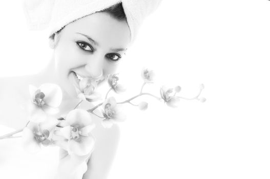 beauty halth and spa wellness isolated young woman face portrait closeup with towel and flower treatment