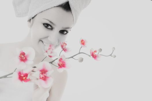 beauty halth and spa wellness isolated young woman face portrait closeup with towel and flower treatment