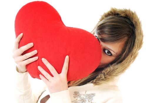 happy young woman with heart isolated on white